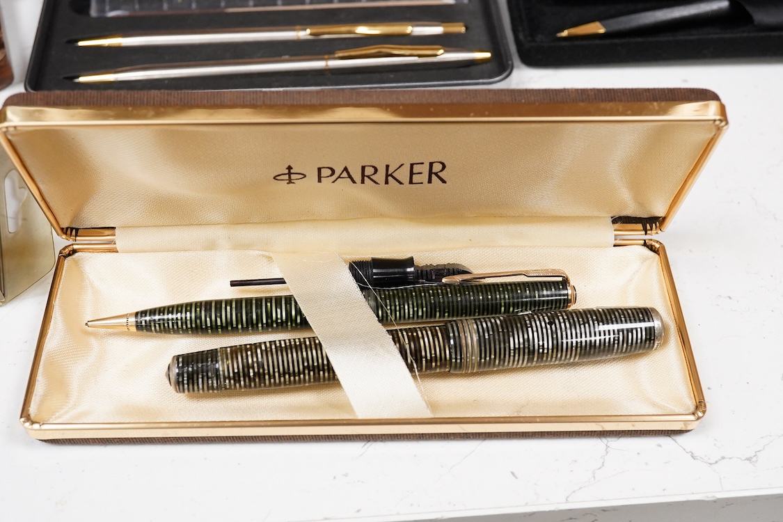 A quantity of boxed fountain pens and ballpens